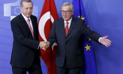 أردوغان يهدد الاتحاد الأوروبي بفتح الحدود أمام اللاجئين.. وميركل ترد